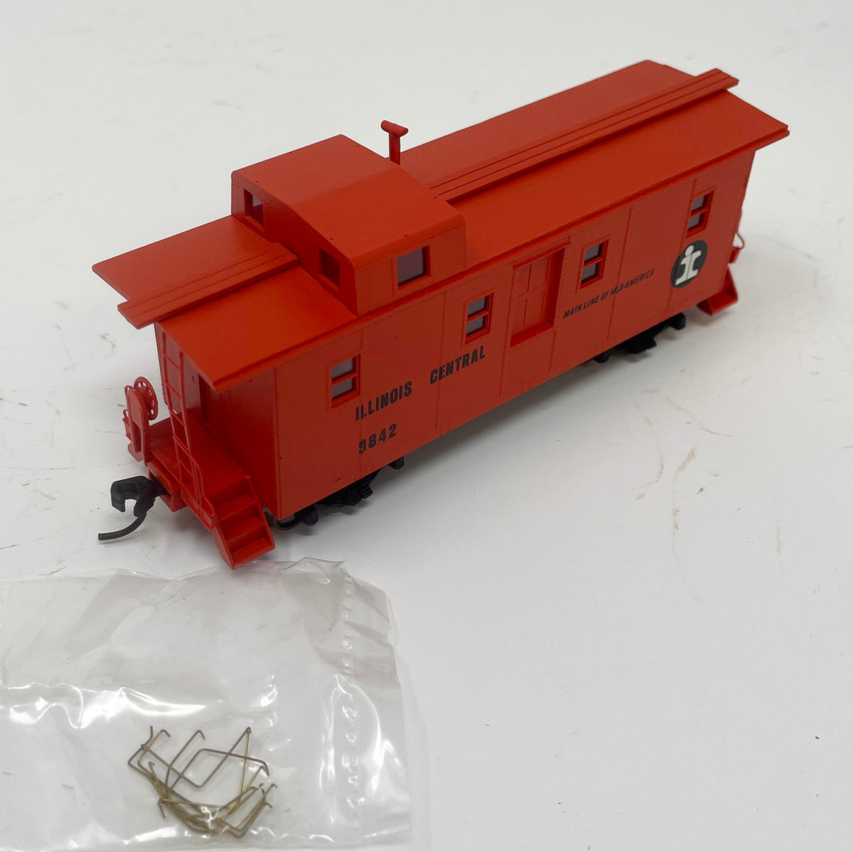 CCS1029 IC Side Door Caboose - IC Orange #9842