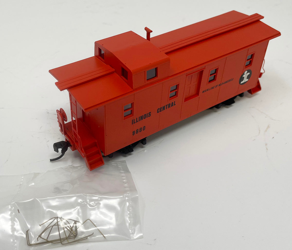 CCS1030 IC Side Door Caboose - IC Orange #9880