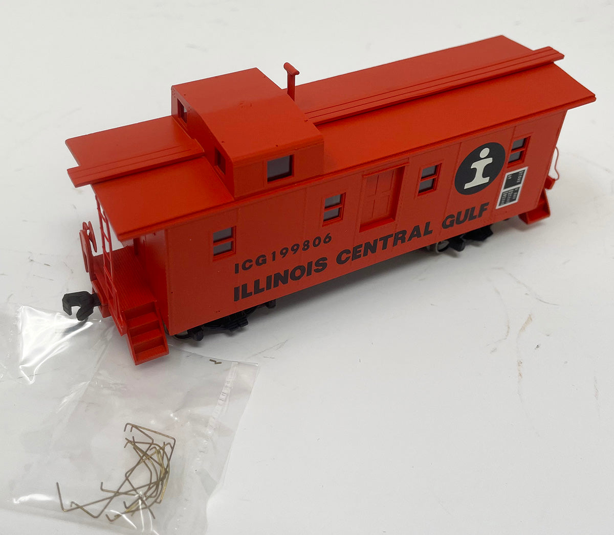 CCS1034 IC Side Door Caboose - ICG Orange #199806